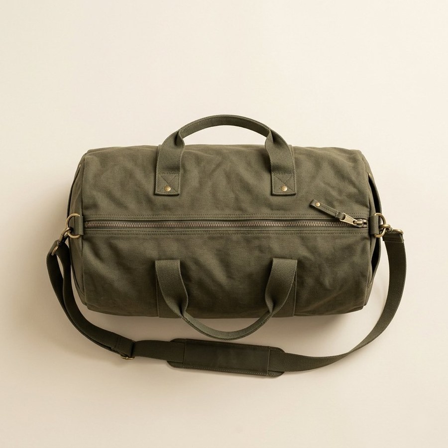 Duffel — olive green waxed canvas duffel bag with shoulder strap