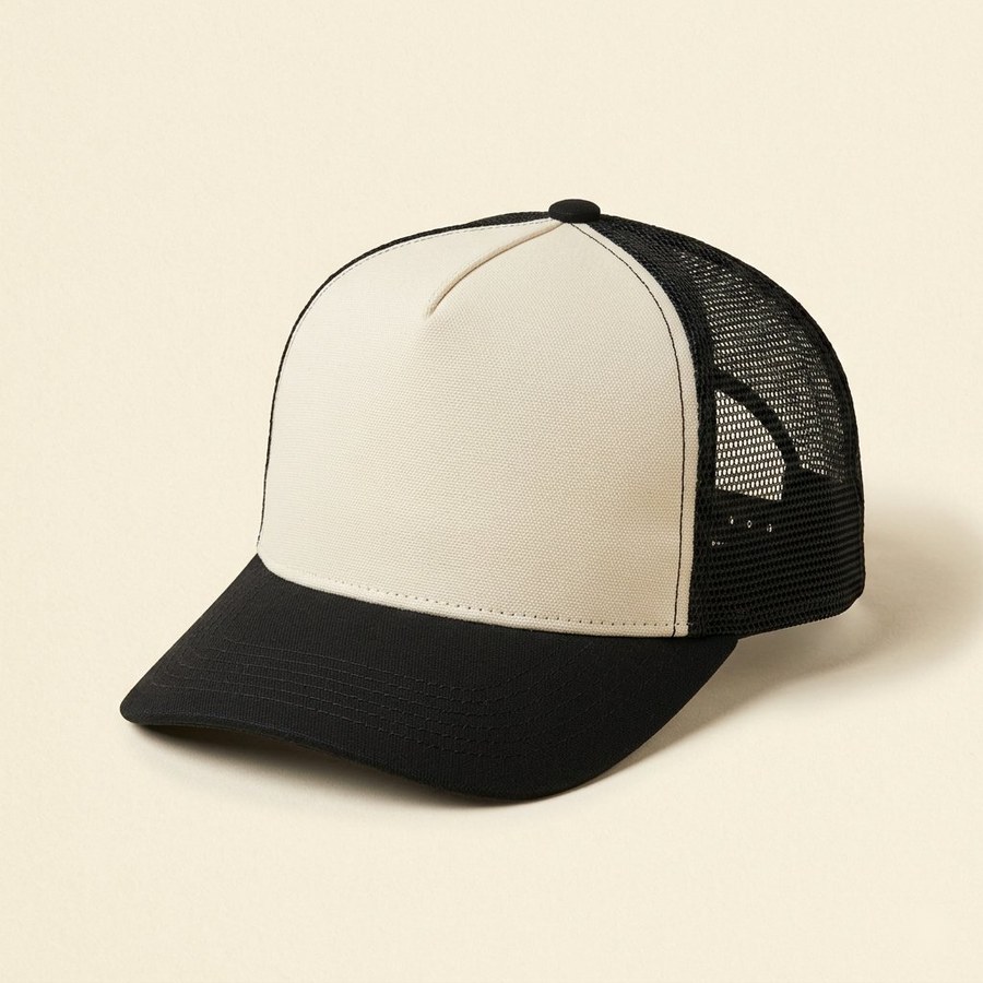 Trucker Hat — cream front foam panel with black mesh back
